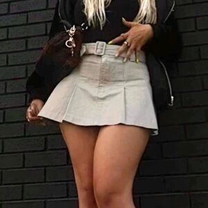 BEIGE PLEATED MINI SKIRT WITH BELT DETAILING